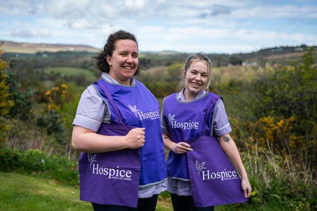 Hospice staff members wearing Hospice branded merchandise