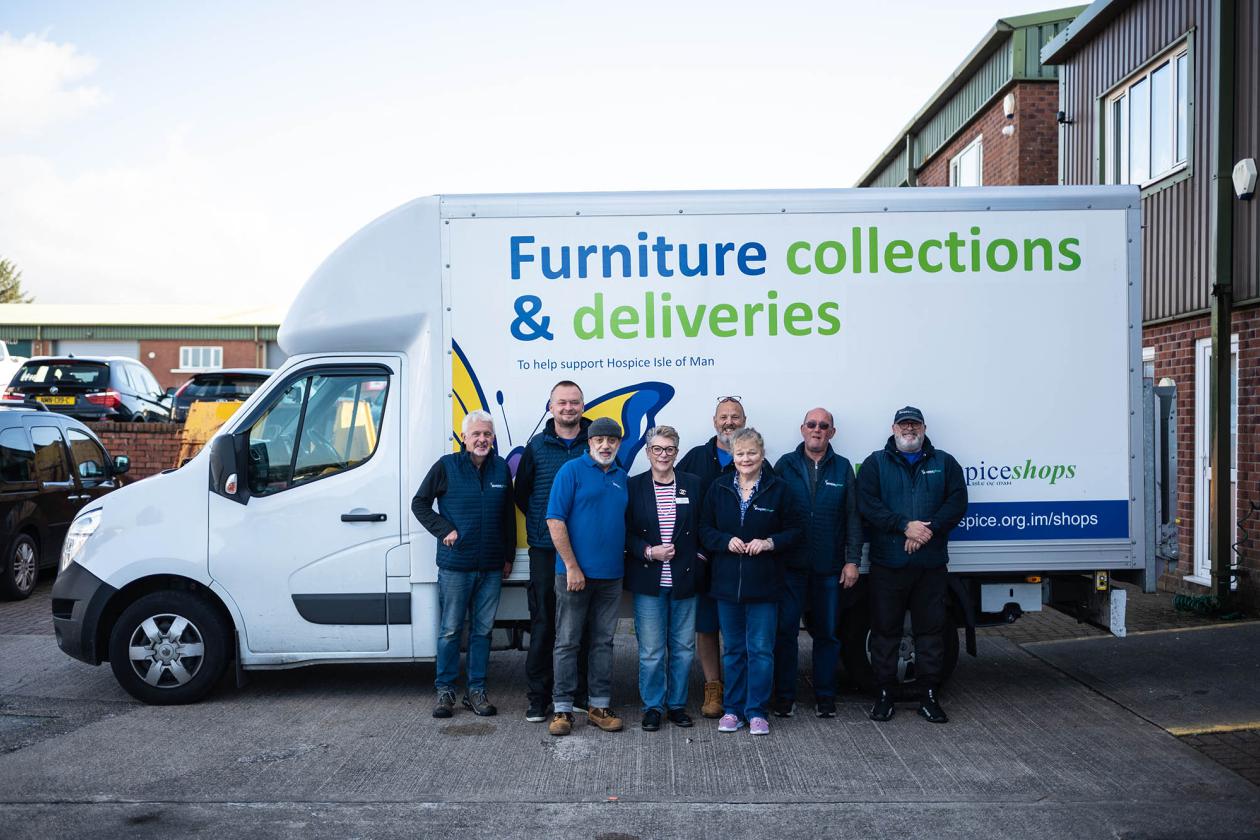 Hospice shops team with a Hospice Shops delivery van