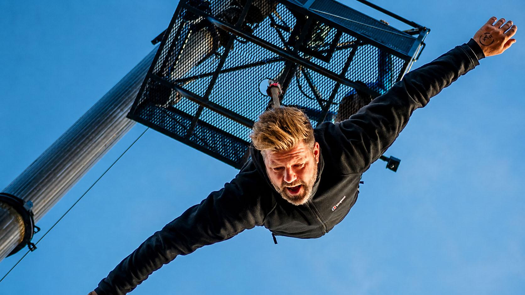 Man bungee jumping