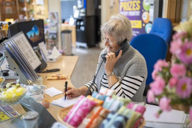 Hospice volunteer in the reception area
